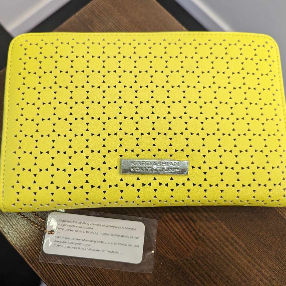 Kardashian Kollection yellow clutch